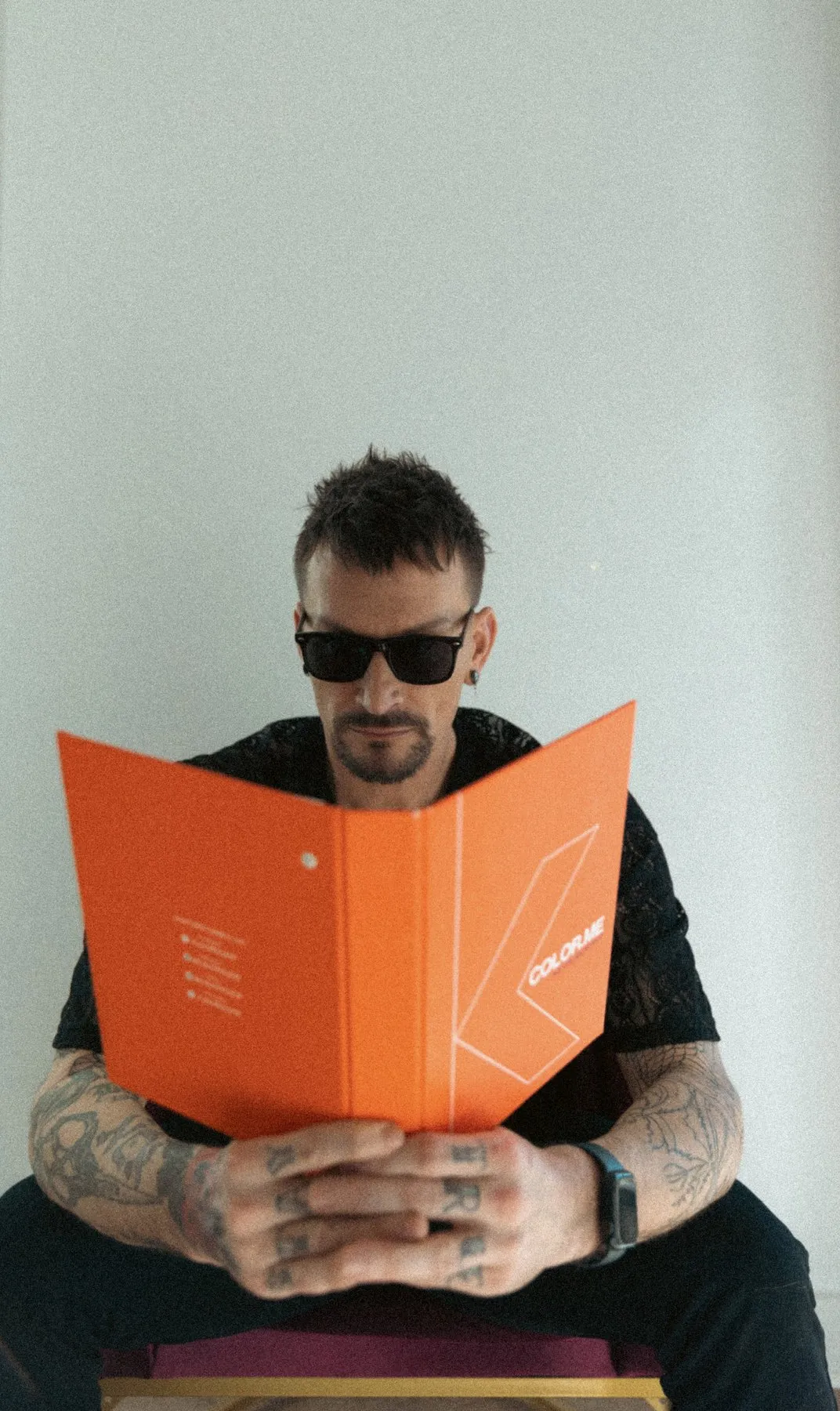 Stylist reviewing a professional color book